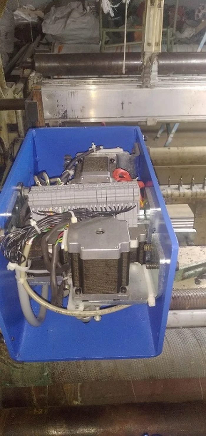 Machined tuck-in device prototype on the workshop floor